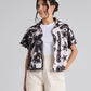 Camisa de lino color arena con bordados lineales de la marca colombiana Juliana Sanchez, disponible en Casa Precis.