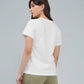 Camiseta en algodón marfil con bordado Renacer para mujer – Juliana Sanchez | Casa Precis, Concept Store. Tercer plano.