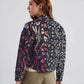 Chaqueta tipo parka azul con bordado Dual Soul para mujer – Juliana Sanchez | Casa Precis, Concept Store. Tercer plano.