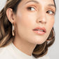 Aretes tipo candonga gruesos Chunky Hoops en acrílico rosado traslúcido para mujer – Sofía Llanos | Casa Precis, Concept Store. Segundo plano.