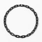 Collar Hera en acrílico negro con dije de diseño orgánico circular para mujer – Sofía Llanos | Casa Precis, Concept Store. Priimer plano.