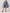 Falda Serena de Nord & Sud con silueta fluida y corte midi en textil premium para mujer – Moda colombiana elegante | Casa Precis, Concept Store. Tercer plano.
