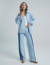 Jean azul de tiro alto en dos tonos con diseño de mitades para mujer – Juliana Sanchez | Casa Precis, Concept Store. Primer plano.