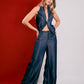 Pantalón Kiro de Fredda con silueta de pierna ancha y tiro alto en lino para mujer – Moda colombiana de lujo | Casa Precis, Concept Store. Primer plano.