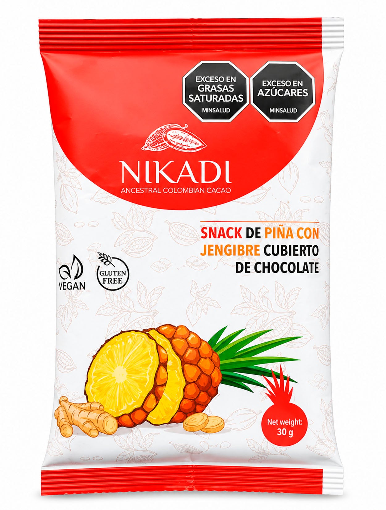 Empaque de snack NIKADI de piña con jengibre cubierto de chocolate, vegano y libre de gluten. Diseño de empaque blanco y coral con ilustración de piña y jengibre fresco – Confitería de autor colombiana | Casa Precis, Concept Store