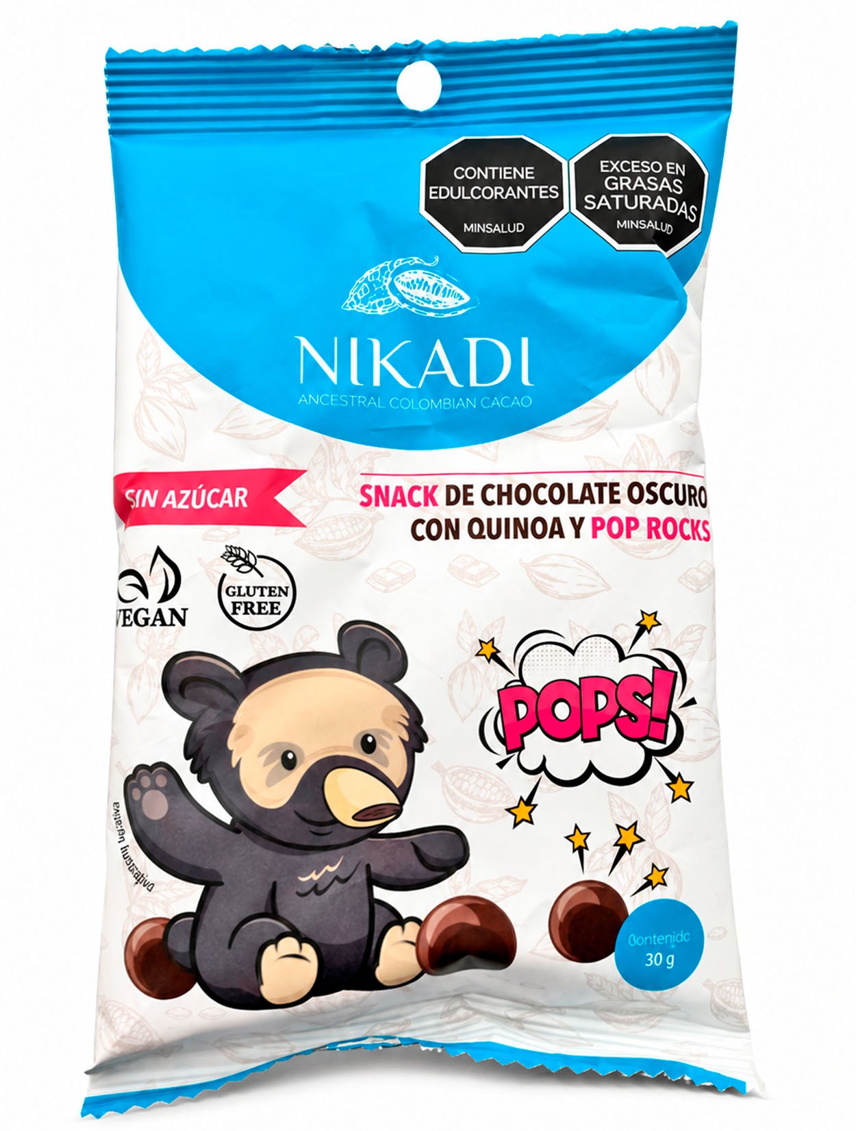 Empaque de snack NIKADI de chocolate oscuro con quinoa y pop rocks, sin azúcar, vegano y sin gluten. Ilustración de oso de anteojos sobre fondo blanco y azul – Chocolatería de lujo funcional colombiana | Casa Precis, Concept Store