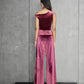 Pantalón Velvet Pulse de Nord & Sud en terciopelo negro con bota amplia y talle alto para mujer – Moda colombiana de gala | Casa Precis, Concept Store. Segundo plano.