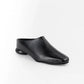Botín Yuval de Javier Jiménez en cuero negro con diseño de tiras entrelazadas y hebilla – Calzado colombiano de lujo | Casa Precis, Concept Store