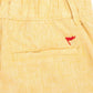 Bermuda de lino premium en color amarillo de la marca Red Flag – Ropa de verano de lujo y diseño de autor hecho en Colombia | Casa Precis, Concept Store