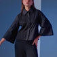 Camisa negra con contraste de paneles sólidos y traslúcidos modelo Dualité de la marca Disímil – Camisería de lujo y diseño contemporáneo de autor hecho en Colombia | Casa Precis, Concept Store