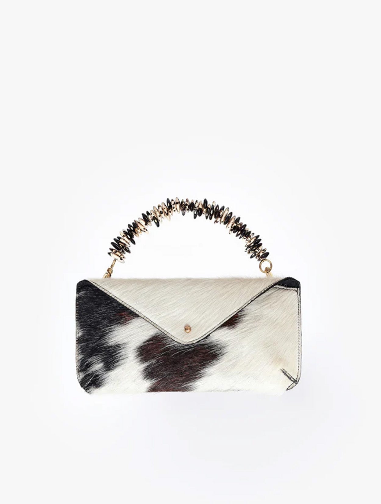 Cartera tipo Sobre Nopal de la marca Celestino confeccionada en cuero con pelo natural – Marroquinería de lujo artesanal y accesorios de mano de diseño colombiano | Casa Precis, Concept Store