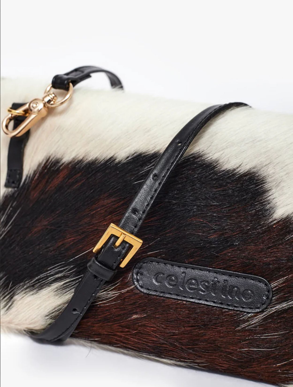 Cartera tipo Sobre Nopal de la marca Celestino confeccionada en cuero con pelo natural – Marroquinería de lujo artesanal y accesorios de mano de diseño colombiano | Casa Precis, Concept Store