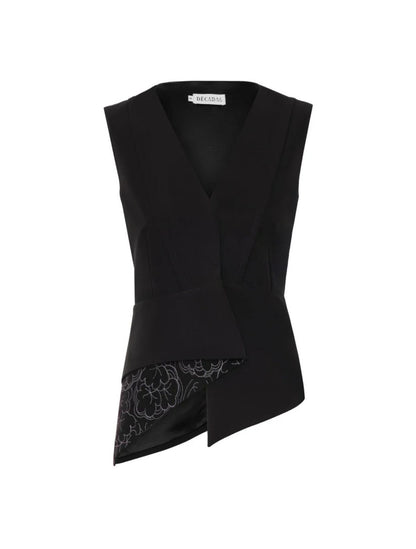 Greta Vest de la marca Décadas con silueta entallada y aplique posterior de flor en alto relieve tridimensional – Chaleco sastrero de lujo hecho en Colombia | Casa Precis, Concept Store