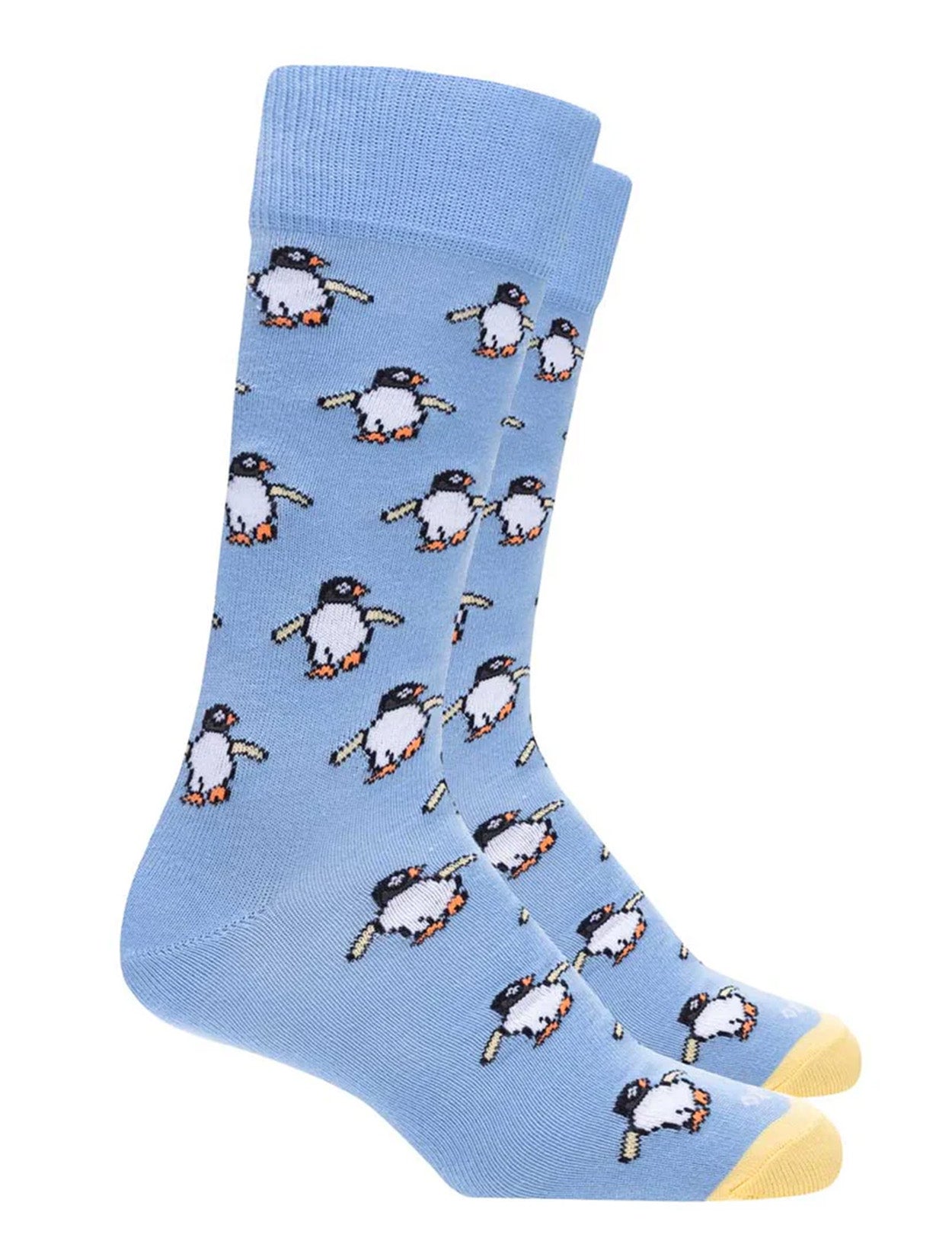 Medias color azul con bordado de pingüinos de la marca Bassto – Accesorios de moda colombiana de lujo y diseño gráfico de autor | Casa Precis, Concept Store