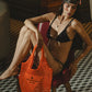 Mochila Naranja de la marca Flor Amazona de diseño de autor artesanal con detalles de lujo contemporáneo – Bolso exclusivo hecho en Colombia | Casa Precis, Concept Store