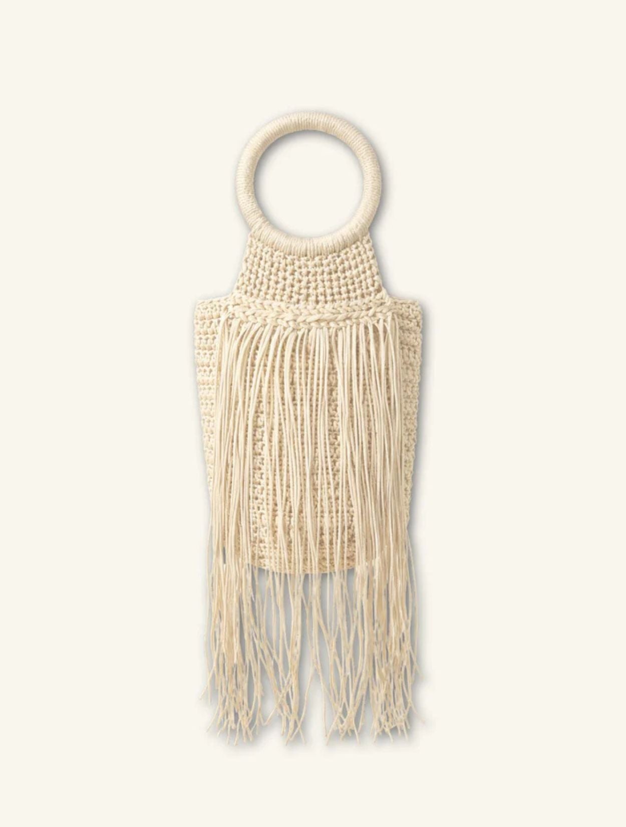 Mochila Goia de la marca Arte & Tejido tejida a mano en crochet con motivos geométricos y detalle de borlas tradicionales – Bolso artesanal de lujo hecho en Colombia | Casa Precis, Concept Store