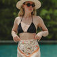 Pareo de playa Bandana Beige Pájaros de la marca Flor Amazona con estampado gráfico verde de diseño de autor multifuncional – Ropa de playa de lujo hecha en Colombia | Casa Precis, Concept Store
