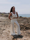 Pantalón Alma de la marca Bianco en color neutro con silueta fluida y tiro alto – Pantalón de lujo y diseño de autor hecho en Colombia | Casa Precis, Concept Store