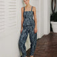 Pantalón tipo barrel en denim con efecto de manchas de la marca Diana Buelvas – Moda colombiana de lujo con silueta arquitectónica y diseño de autor | Casa Precis, Concept Store