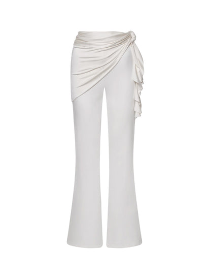 Pantalón fluido Cyanea Pants Ivory de la marca Barcés en tono marfil con bota ancha wide-leg y tiro alto – Pantalón de resortwear de lujo hecho en Colombia | Casa Precis, Concept Store