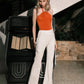 Pantalón fluido Cyanea Pants Ivory de la marca Barcés en tono marfil con bota ancha wide-leg y tiro alto – Pantalón de resortwear de lujo hecho en Colombia | Casa Precis, Concept Store