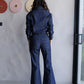 Pantalón denim con pespuntes contrastados de la marca Diana Buelvas – Moda colombiana de lujo con diseño sastrero y costuras visibles | Casa Precis, Concept Store