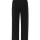 Greta Pants de la marca Décadas de tiro alto y bota ancha con detalle de flor en alto relieve tridimensional – Pantalón sastrero de lujo hecho en Colombia | Casa Precis, Concept Store