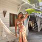 Pareo de playa Bandana Flor Amazona de la marca Flor Amazona con estampado gráfico verde de diseño de autor multifuncional – Ropa de playa de lujo hecha en Colombia | Casa Precis, Concept Store