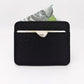Portadocumentos de cuero negro con textura de escamas de la marca Pardo – Accesorios de marroquinería de lujo y diseño de autor hecho en Colombia | Casa Precis, Concept Store
