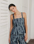 Top corto en denim con efecto de manchas artísticas de la marca Diana Buelvas – Moda colombiana de lujo contemporáneo y diseño de autor | Casa Precis, Concept Store