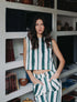 Top corto en denim de rayas verticales de la marca Diana Buelvas con diseño estructurado – Moda colombiana de lujo contemporáneo y estilo urbano | Casa Precis, Concept Store